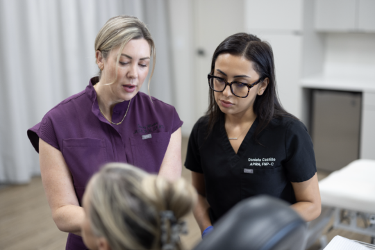 Aesthetic providers reviewing what they learned after medical aesthetics training